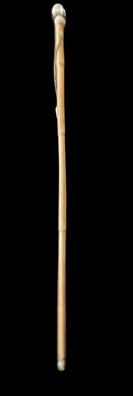 bastone con pomolo in avorio e ebano raffigurante testa di Pierrot con espressione  grottesca.