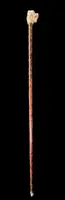 A walking stick with an ivory knob shaped like the head of a Molosser dog.