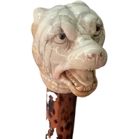 A walking stick with an ivory knob shaped like the head of a Molosser dog.