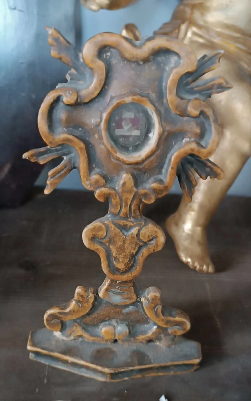 Small lacquered wooden reliquary containing an 18th-century relic