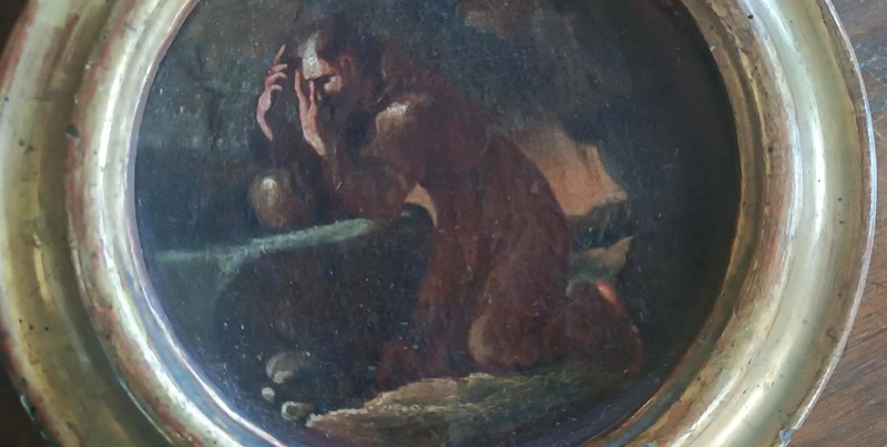 An antique painting on canvas, a sketch, depicting St. Francis of Assisi -
