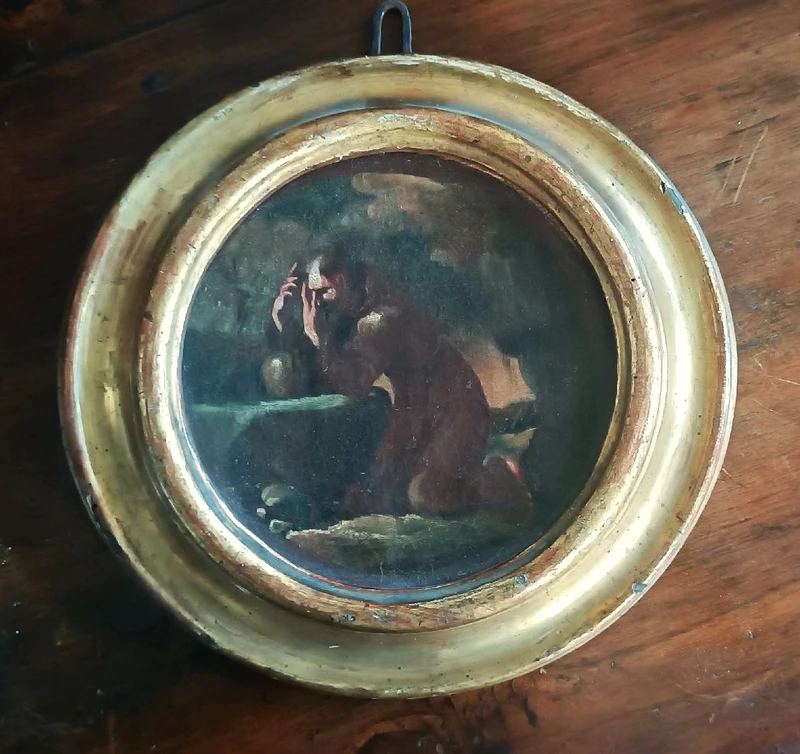 An antique painting on canvas, a sketch, depicting St. Francis of Assisi -