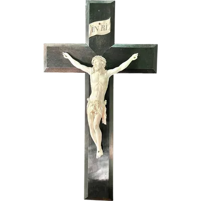Christ carved from ivory on a cross made of ebony.