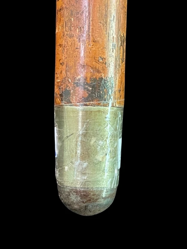 A walking stick with an ivory knob carved in the round with Commedia dell’Arte masks.
