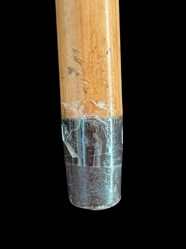 Cane with a round ivory knob carved with Commedia dell'Arte masks. Japan.