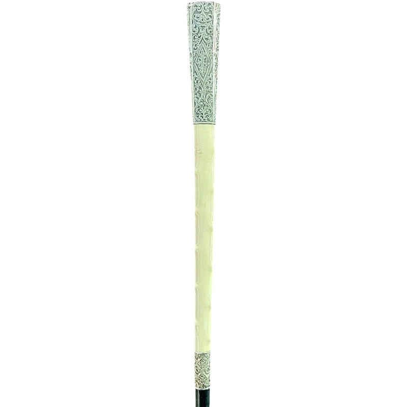 An ivory "evening" cane with tips and embossed silver featuring rocaille motifs