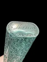 An ivory "evening" cane with tips and embossed silver featuring rocaille motifs