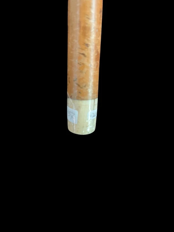 Cane with a spherical ivory knob on one side, engraved with a female figure