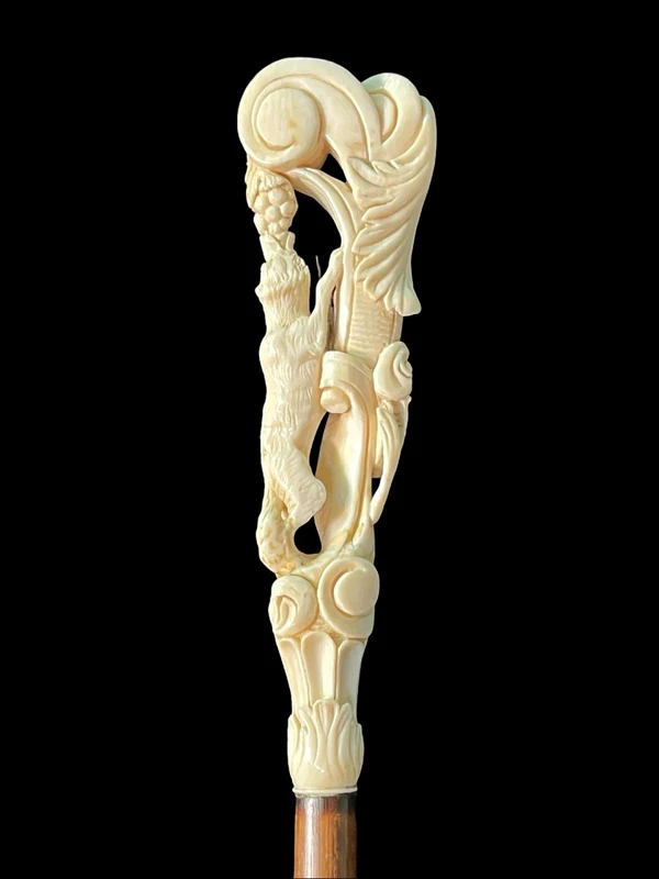 Cane with an ivory knob depicting a fox and grapes