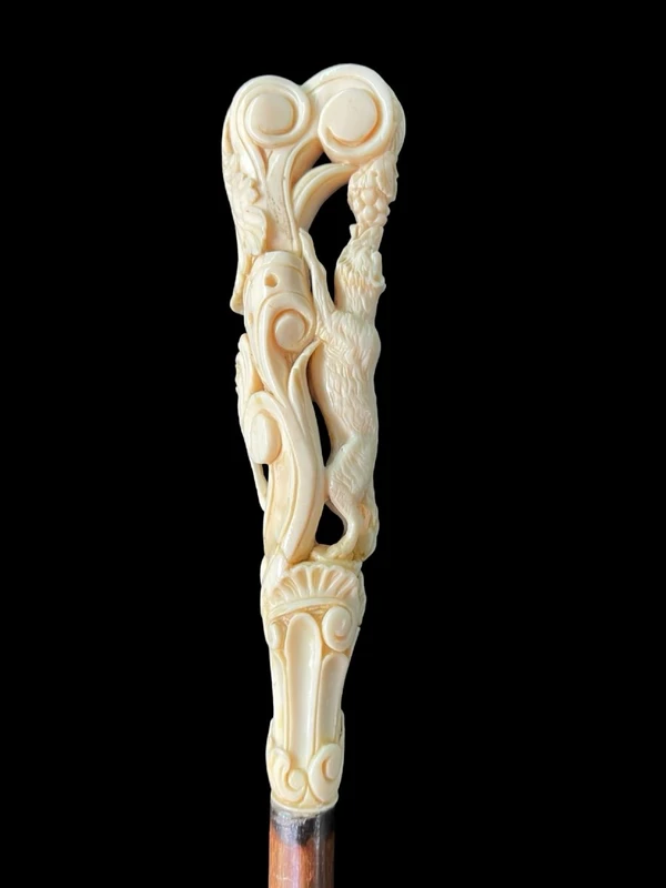 Cane with an ivory knob depicting a fox and grapes