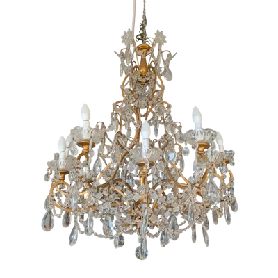 Twelve-light chandelier made of gold metal and crystal, with drops