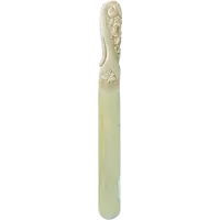 A one-piece ivory letter opener engraved with floral and rocaille motifs.