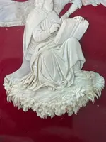 Bas-relief sur une plaque d'ivoire représentant un ange avec Moïse (?).