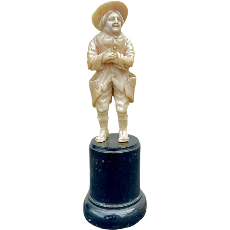 Small ivory sculpture depicting a beggar. Netherlands.