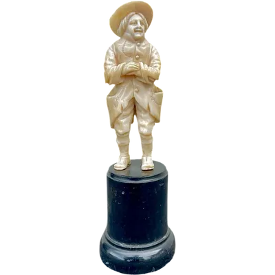 Small ivory sculpture depicting a beggar. Netherlands.