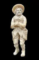 Small ivory sculpture depicting a beggar. Netherlands.
