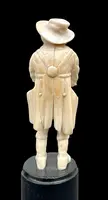 Small ivory sculpture depicting a beggar. Netherlands.