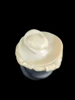 Small ivory sculpture depicting a beggar. Netherlands.