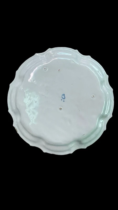 Three majolica plates with scalloped rims and high-fire “Baroque fruit” decoration.