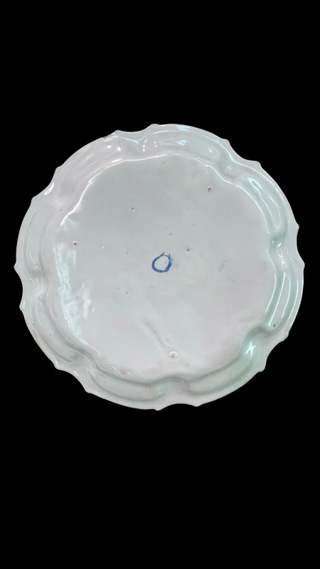 Three majolica plates with scalloped rims and high-fire “Baroque fruit” decoration.