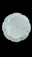 Three majolica plates with scalloped rims and high-fire “Baroque fruit” decoration.