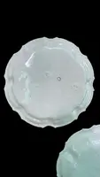 Three majolica plates with scalloped rims and high-fire “Baroque fruit” decoration.