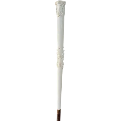 An evening cane with an ivory knob featuring a relief shield and rocaille motifs.