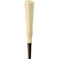 An evening cane with a square-section ivory knob featuring three monkeys engraved in bas-relief.