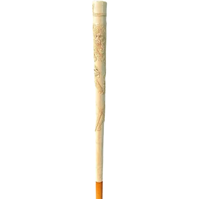 An evening cane with an ivory “plume” knob engraved with lions in bas-relief.