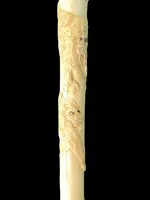 An evening cane with an ivory “plume” knob engraved with lions in bas-relief.