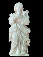 A bas-relief sculpture in ivory depicting a saint.