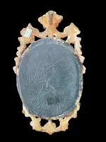 A bas-relief sculpture in ivory depicting a saint.