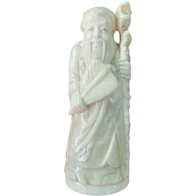 Ivory sculpture depicting a male figure.