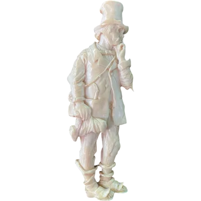 An ivory bas-relief depicting a beggar.