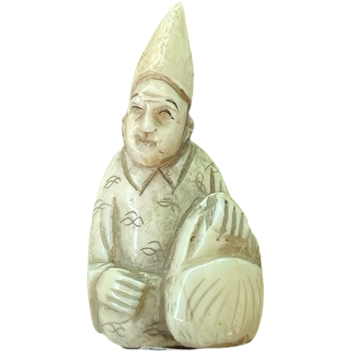 Netsuke in avorio raffigurante personaggio maschile