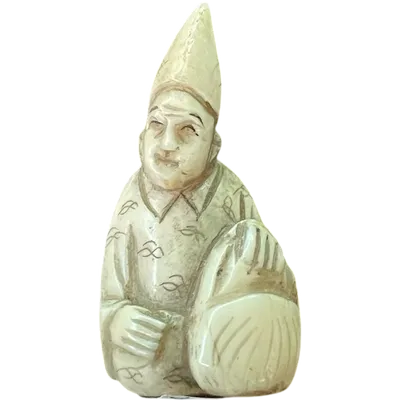 Ivory netsuke depicting a male figure