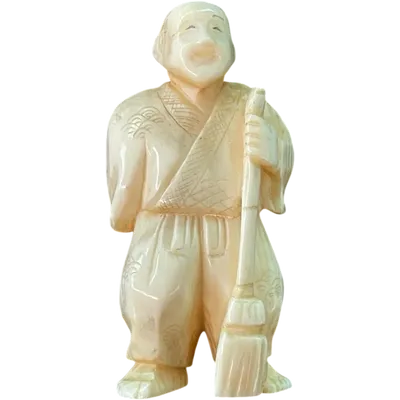 Ivory netsuke depicting a male figure