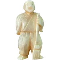 Ivory netsuke depicting a male figure