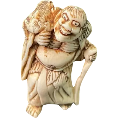 Ivory netsuke depicting a male figure