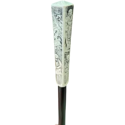 A walking stick with a vertical, square-sectioned knob engraved in bas-relief with oriental figures.