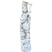 Sculpture en ivoire de style okimono représentant une figure féminine avec un instrument de musique