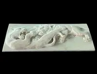 Placca-bassorilievo in avorio raffigurante due leoni che lottano.