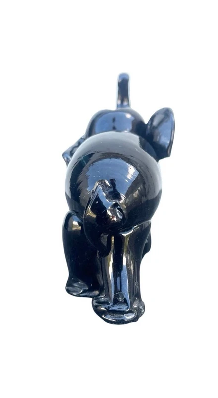 Black glass elephant with milky glass tusks. Made by Toso. Murano. 11x10x5 cm.