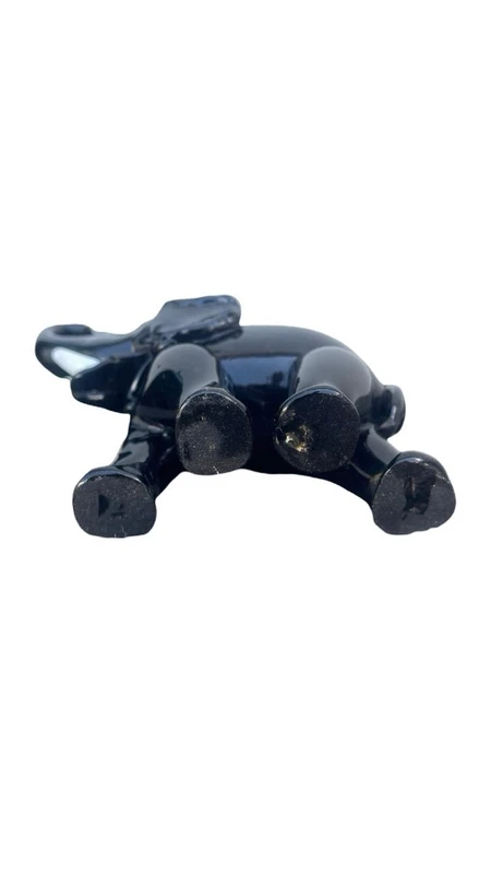 Black glass elephant with milky glass tusks. Made by Toso. Murano. 11x10x5 cm.