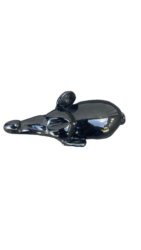 Black glass elephant with milky glass tusks. Made by Toso. Murano. 11x10x5 cm.