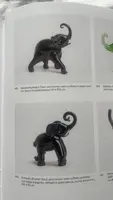 Black glass elephant with milky glass tusks. Made by Toso. Murano. 11x10x5 cm.