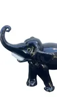 Black glass elephant with milky glass tusks. Made by Toso. Murano. 11x10x5 cm.