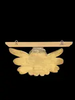 Applique murale en bois sculpté et feuille d'or, ornée d'une tête d'ange chérubin.