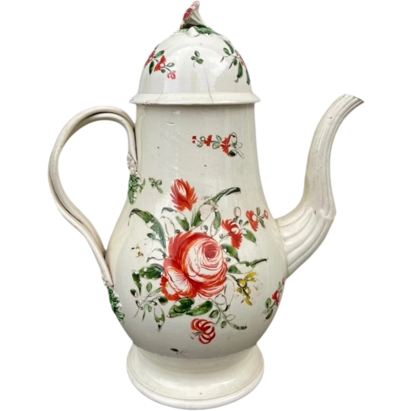 Earthenware coffee pot decorated with roses. Derbyshire, England.