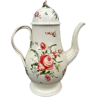 Earthenware coffee pot decorated with roses. Derbyshire, England.